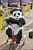 A panda on a bicycle in the Village Départ ! (1148x)