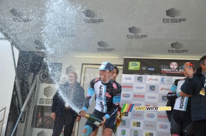 Ryan Roth (Spidertech) celebrates with champagne (2) (382x)