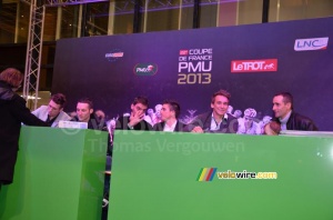 The cyclists are ready for the autograph session (514x)