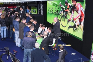 The riders take some time for a signing session (2) (407x)